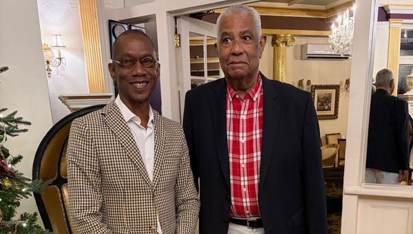 Christopher Jarrett, president of the Jamaica Hotel and Tourist Association (left) with John Lynch, chairman of the Jamaica Tourist Board.