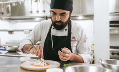 Chef Cristian Puente oversees culinary programming across Pikaia Lodge and the Vision Pikaia yacht.