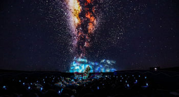 Inside the Sphere Theater, guests are immersed in 360-degree visuals during the "Mele" performance.