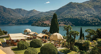 The restaurant and Italian garden at Passalacqua, a 24-room villa overlooking Lake Como.