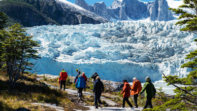 Hiking on glacial terrain is a highlight for many guests on an Australis Cruises sailing.
