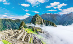 Agricultural terraces and ancient houses in Machu Picchu. The daily visitor cap for Machu Picchu is expected to rise from 4,044 to 4,500 this year.