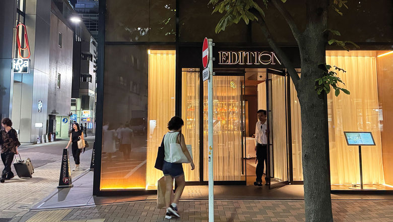 The author's daughter, shopping bags in hand, returns to the Tokyo Edition Ginza after a day of mother-daughter shopping.