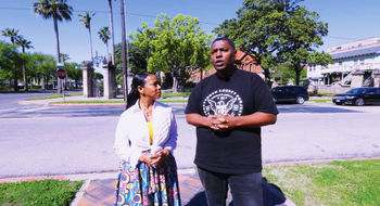 Denella Ri'chard and historian Sam Collins discuss the Juneteenth legacy on a walk through Galveston.